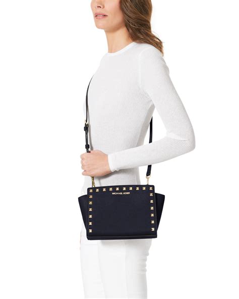 michael kors studded messenger bag|Michael Kors large Messenger bag.